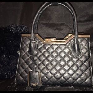 Black and gold handbag